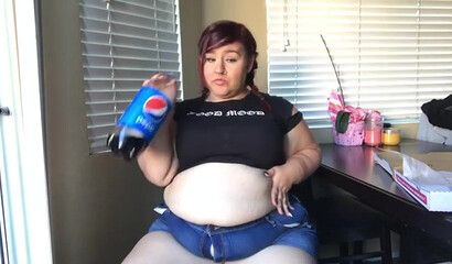 Nasty BBW with big tits drinks and eats
