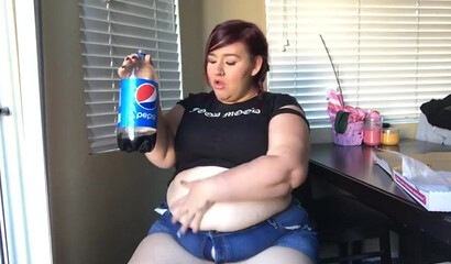 Nasty BBW with big tits drinks and eats