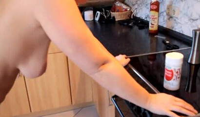 Mature amateur homemaker displays her phat bottom while cleaning her kitchen thoroughly