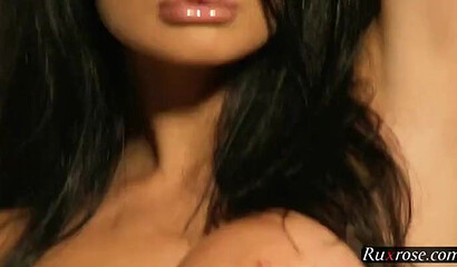 Stunning brunette pulls her shift off and reveals huge tits that go well with her ass
