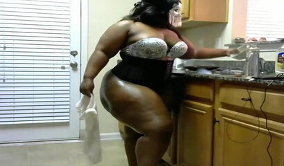Chubby ebony babe with a massive ass shows off her enormous gorgeous butt on the webcam