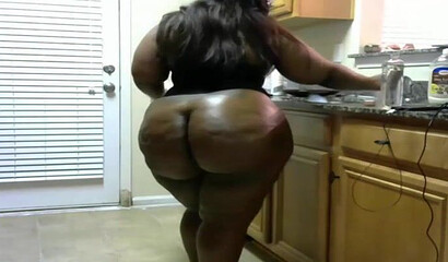 Chubby ebony babe with a massive ass shows off her enormous gorgeous butt on the webcam