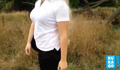 Sultry blonde fat ass babe stripping her clothes off in the park and touching her titties