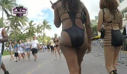 Cruising around the coast and filming a bunch of big ass ebony babes wearing sexy bikinis