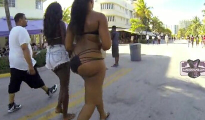 Cruising around the coast and filming a bunch of big ass ebony babes wearing sexy bikinis