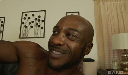 Ebony chick wearing fishnet stockings drilled in her pussy and her ass hole by huge boner