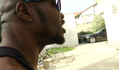 Ebony chick wearing fishnet stockings drilled in her pussy and her ass hole by huge boner