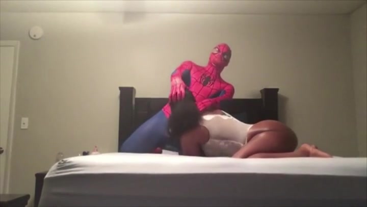 Amateur ebony slut with massive bottom rides a guy in a Spider-Man costume  in her bedroom