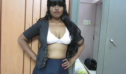 Smiling Indian strips down and presents her giant tits and massive ass while masturbating