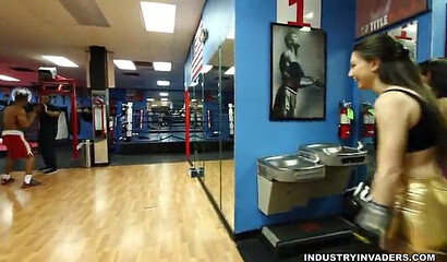 Two big booty cuties show off their amazing assets in the gym while they work out hard