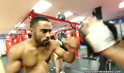 Two big booty cuties show off their amazing assets in the gym while they work out hard