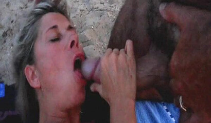 Mature blonde blows cock outdoors and gets fucked