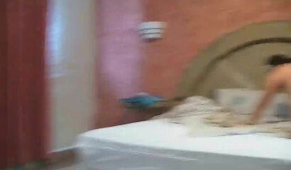 Mature masked Latina fucks with younger guy