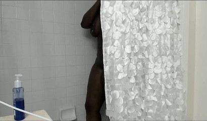 Lesbian ebonies with huge tits and ass under the shower