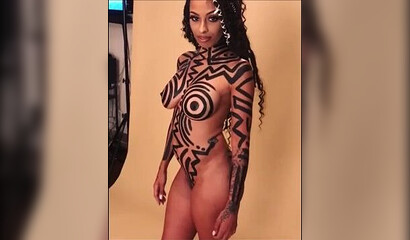 Compilation of big booty ebonies posing naked with body art on them