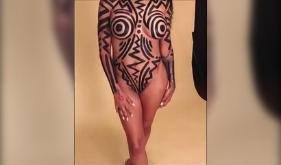 Compilation of big booty ebonies posing naked with body art on them