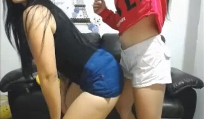 Lesbian Latin girls licking each other's pussies on webcam