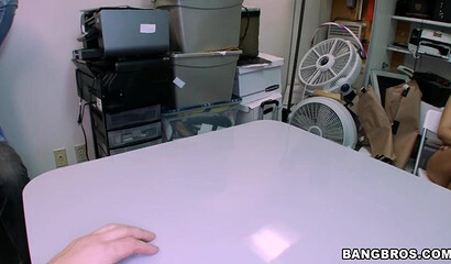 Blonde pornstar Britney Amber strips and shows her big round butt