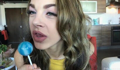 Slutty teen Evelin Stone plays with lollipop and sticks it in her ass