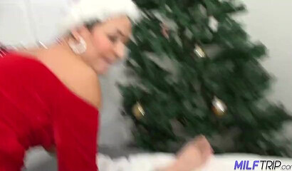 Mom with big tits giving son a blowjob and cock riding for a Christmas