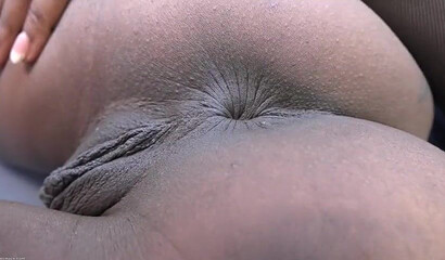 Ebony with big fake knockers Sarah Banks sticking glass dildo in her hole