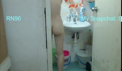 Spying on young skinny babysitter while she's showering