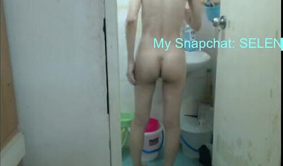 Spying on young skinny babysitter while she's showering