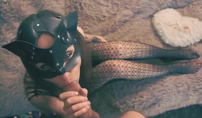 Slutty amateur brunette in lingerie and mask sucking fat cock