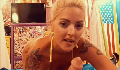 Amateur inked blonde Keri Love can't spend a day without sucking big dick