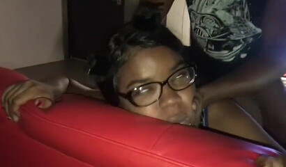 Nerdy ebony teen gets bent over the sofa and pounded by her boyfriend