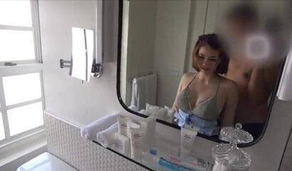 Beautiful Japanese doll gets her perky tits exposed and massaged in the bathroom