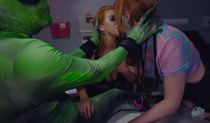 Two busty redhead April O'neil & Lauren Phillips blow off and fuck Alien