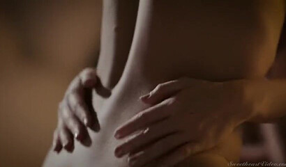 Attractive lesbian couple having intense sex in bed late night