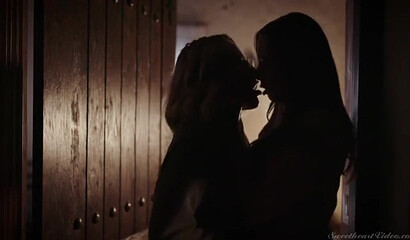 Attractive lesbian couple having intense sex in bed late night