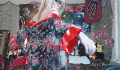 Geeky blonde in stockings strips and oils up her sexy body