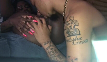 Ebony slut with pierced pussy and her boyfriend give each other oral pleasure