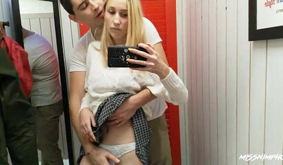 Blonde babe fucks and sucks off her lover in the changing room