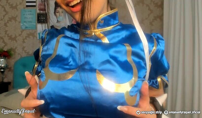 Busty cosplay chick Emanuelly Raquel squeezing big tits and masturbates on webcam