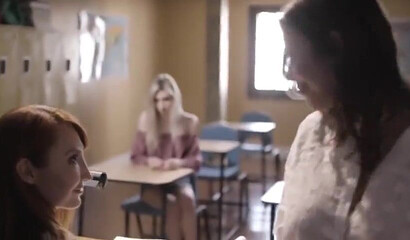 Lesbian schoolgirls and MILF teacher having sex in the classroom