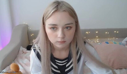 Barely legal blonde teen teasing and playing with her pussy on webcam