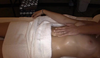 Hot babe gets fingered by lesbian masseur in homemade action