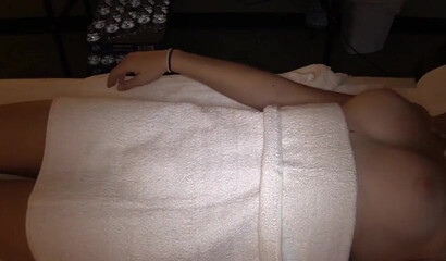 Hot babe gets fingered by lesbian masseur in homemade action