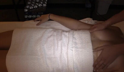 Hot babe gets fingered by lesbian masseur in homemade action