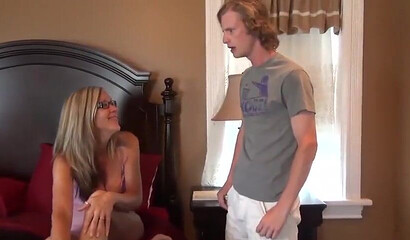 Amateur stepmom with big tits helps her stepson with erection