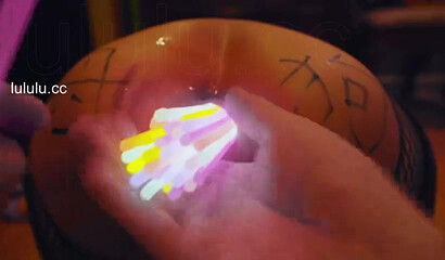 Chinese slut gets her asshole filled with glow sticks