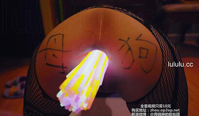Chinese slut gets her asshole filled with glow sticks