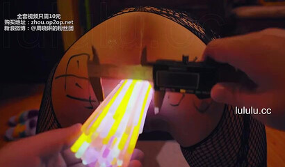 Chinese slut gets her asshole filled with glow sticks