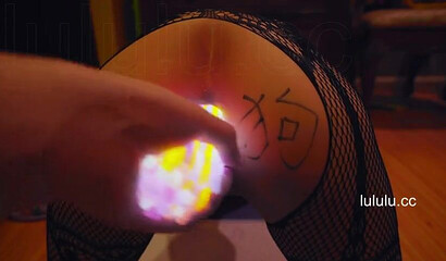 Chinese slut gets her asshole filled with glow sticks