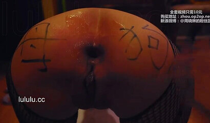 Chinese slut gets her asshole filled with glow sticks