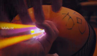 Chinese slut gets her asshole filled with glow sticks